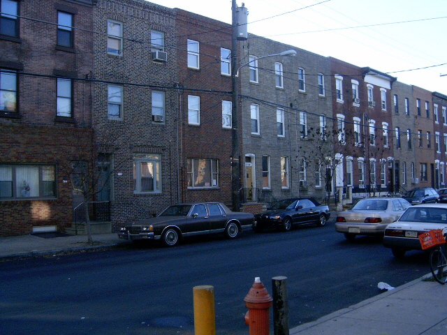 Brick rowhouses on a South Philadelphia block — the housing stock trenchless methods were built for